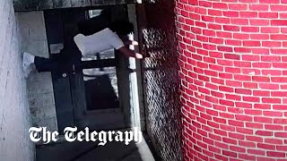 video: Watch: Convicted murderer ‘crab walks’ up prison wall in daring escape