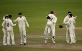 Lancashire players celebrate the win and promotion during day 3 of the Specsavers County Championship: Division Two match between Lancashire and Derbyshire at Emirates Old Trafford on September 12, 2019 in Manchester, England