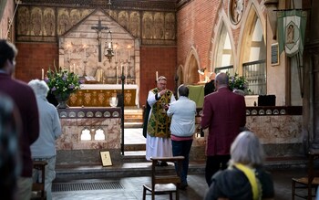 Vicar and Parish Priest Father Robert Norbury leads the congregation of St Michael & All Angels, Sussex, Sunday July 05 2020