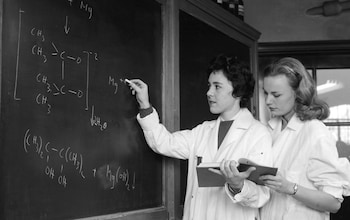 Two women work on equations at Sarah Lawrence College in New York in c1960