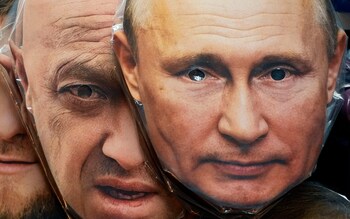 Face masks depicting Russian President Vladimir Putin, right, and Yevgeny Prigozhin, former owner of the private military company Wagner Group