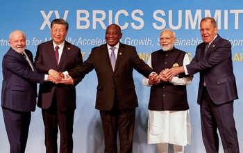 President of Brazil Luiz Inacio Lula da Silva, President of China Xi Jinping, South African President Cyril Ramaphosa, Prime Minister of India Narendra Modi and Russia's Foreign Minister Sergei Lavrov pose for a BRICS family photo during the 2023 BRICS Summit at the Sandton Convention Centre in Johannesburg, South Africa