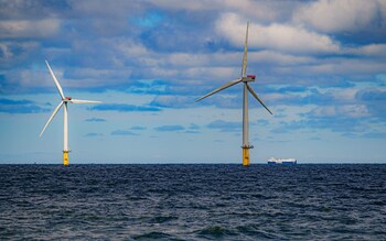 a ship passing wind turbines at RWE's Gwynt y Mor