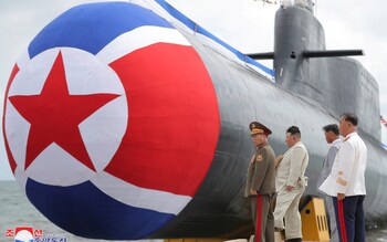 Kim Jong-un with the new submarine